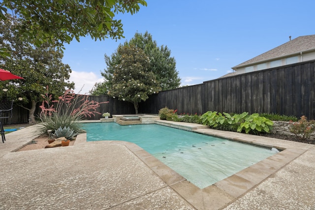945 Brentwood Dr, Murphy, TX 75094 - view of pool with a fenced backyard, a patio area, and a pool with connected hot tub