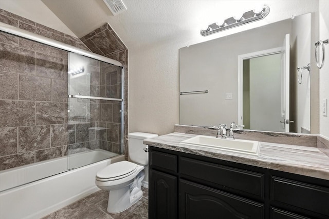 3112 Stonecrop Trl, Denton, TX 76226 - bathroom featuring vanity, enclosed tub / shower combo, a textured wall, and lofted ceiling