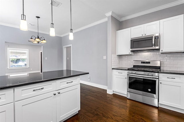 729 S Winnetka Ave, Dallas, TX 75208 - kitchen with stainless steel appliances, decorative backsplash, ornamental molding, dark wood finished floors, and a chandelier