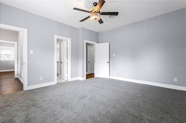 729 S Winnetka Ave, Dallas, TX 75208 - unfurnished bedroom with carpet, baseboards, a ceiling fan, and ensuite bath