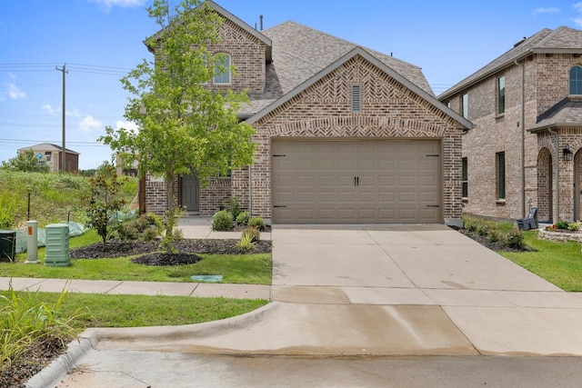 1721 Horseshoe Ln, Van Alstyne, TX 75495 - view of front of property featuring brick siding, an attached garage, concrete driveway, and a shingled roof