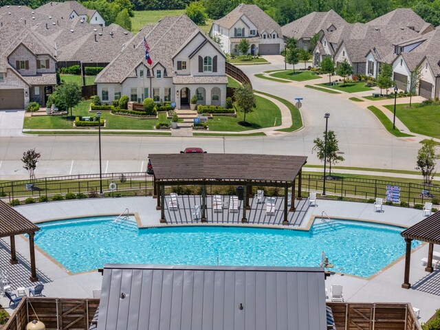1721 Horseshoe Ln, Van Alstyne, TX 75495 - aerial perspective of suburban area with a pool area