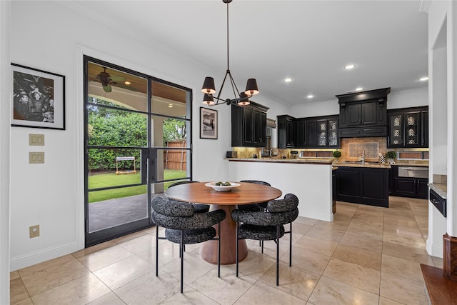 10388 Tobias Ln, Frisco, TX 75033 - dining space with ornamental molding, arched walkways, a chandelier, stairway, and light tile patterned floors