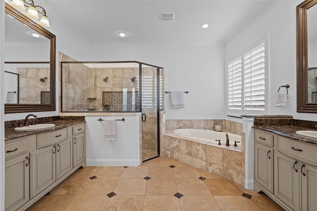 10388 Tobias Ln, Frisco, TX 75033 - bathroom with two vanities, a stall shower, a garden tub, tile patterned flooring, and ornamental molding