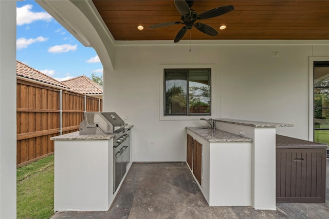 10388 Tobias Ln, Frisco, TX 75033 - view of patio / terrace with exterior kitchen, a ceiling fan, and a sink