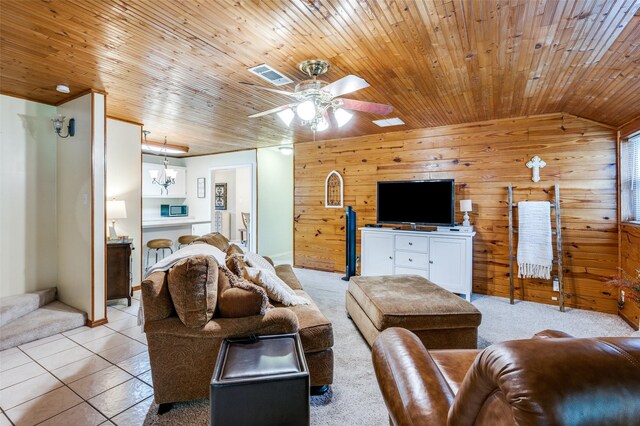 3601 Scranton Dr, Richland Hills, TX 76118 - living area with wooden walls, wood ceiling, light tile patterned flooring, and ceiling fan