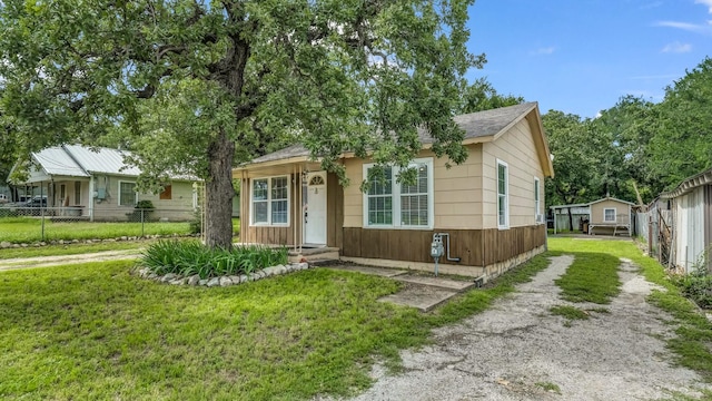 1007 SE 24th St, Mineral Wells, TX 76067 - view of front of house with driveway and a shingled roof