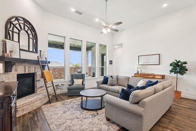 2816 Middleton Dr, Melissa, TX 75454 - living area with a fireplace, dark wood-style floors, baseboards, a ceiling fan, and recessed lighting