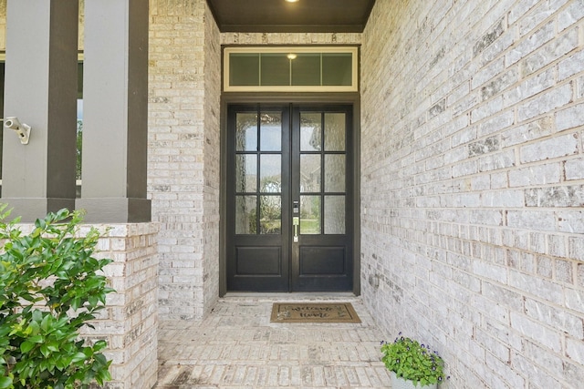 2816 Middleton Dr, Melissa, TX 75454 - view of exterior entry featuring french doors and brick siding