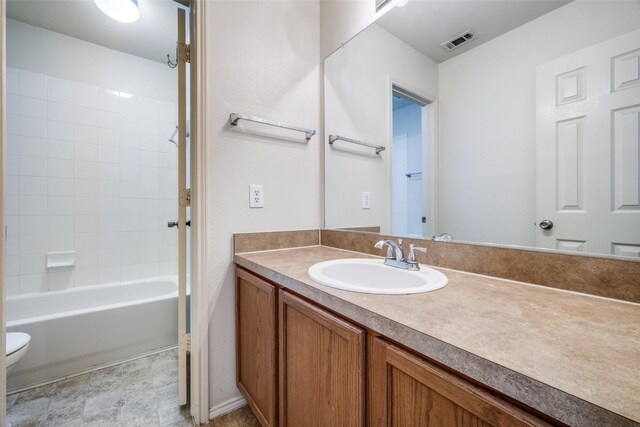3901 Luck Hole Dr, Denton, TX 76210 - full bathroom featuring toilet, vanity, and bathing tub / shower combination