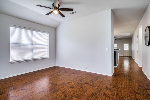 3901 Luck Hole Dr, Denton, TX 76210 - empty room featuring ceiling fan, dark wood-type flooring, baseboards, and vaulted ceiling