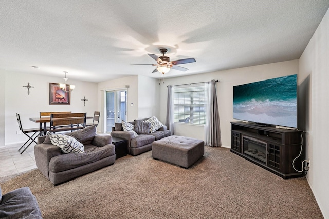 147 Cantle, Waxahachie, TX 75165 - living area with carpet flooring, a textured ceiling, and ceiling fan