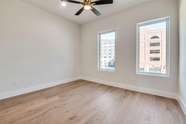 235 E Nash St Unit 124, Grapevine, TX 76051 - unfurnished room featuring baseboards, light wood finished floors, and ceiling fan