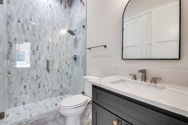 235 E Nash St Unit 124, Grapevine, TX 76051 - full bathroom featuring toilet, a marble finish shower, and vanity