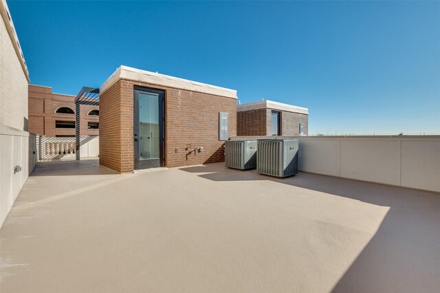 235 E Nash St Unit 124, Grapevine, TX 76051 - view of patio with cooling unit