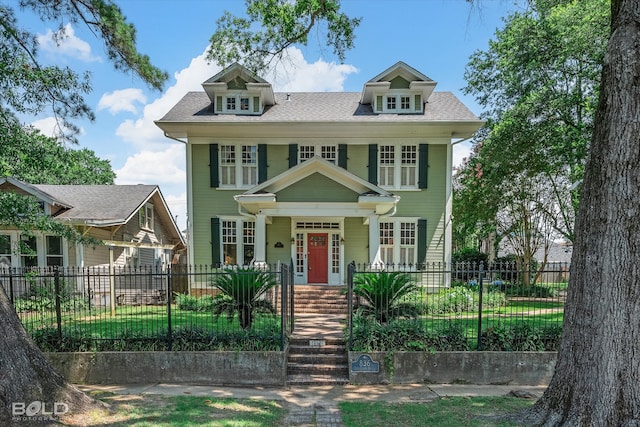 836 Jefferson Pl, Shreveport, LA 71104 - view of front facade with covered porch, a shingled roof, and a fenced front yard