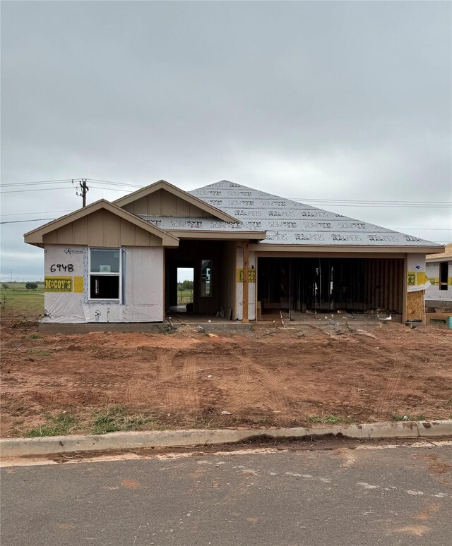 6948 Tin Cup, Abilene, TX 79606 - property under construction featuring an attached garage and board and batten siding