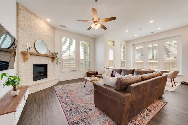 1124 Firecracker Dr, Justin, TX 76247 - living area featuring a fireplace, a ceiling fan, wood finished floors, recessed lighting, and baseboards