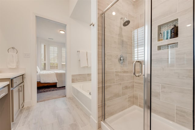 1124 Firecracker Dr, Justin, TX 76247 - full bath featuring a stall shower, vanity, a bath, and ensuite bath