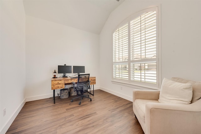 1124 Firecracker Dr, Justin, TX 76247 - office featuring vaulted ceiling, wood finished floors, and baseboards