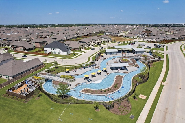 1124 Firecracker Dr, Justin, TX 76247 - aerial overview of property's location with a pool and nearby suburban area