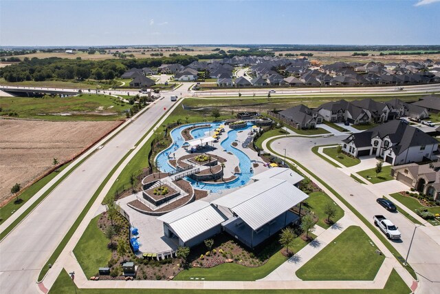 1124 Firecracker Dr, Justin, TX 76247 - aerial perspective of suburban area featuring a pool area
