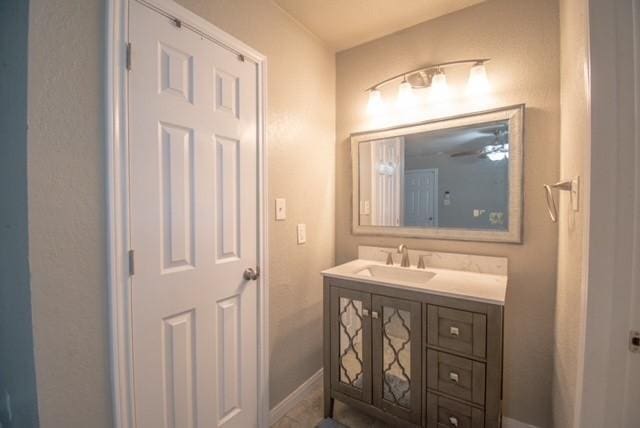 301 Patricia St, Lacy Lakeview, TX 76705 - bathroom with vanity and baseboards