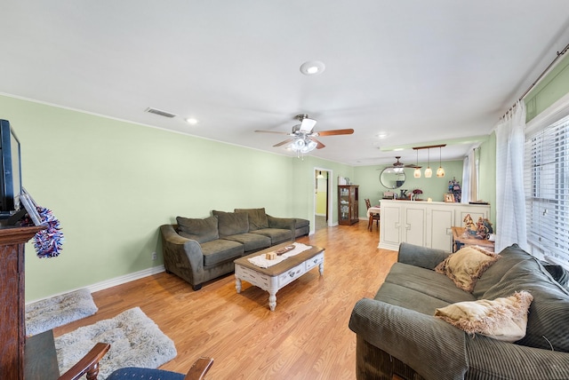 808 S Main St, Winnsboro, TX 75494 - living area featuring ceiling fan, light wood finished floors, baseboards, and recessed lighting