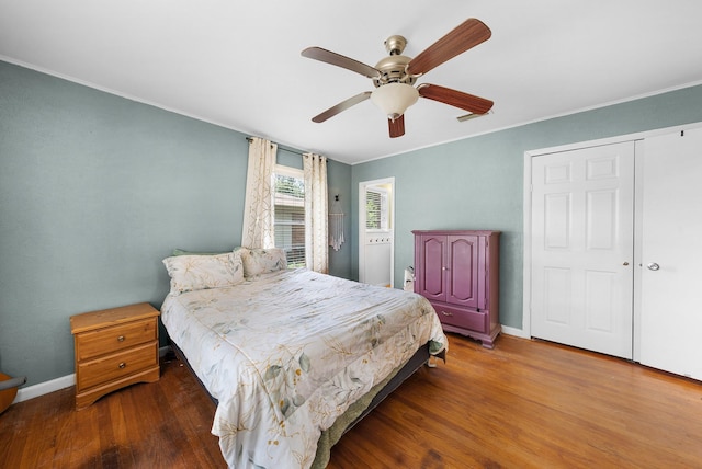 808 S Main St, Winnsboro, TX 75494 - bedroom featuring wood finished floors, ornamental molding, baseboards, and ceiling fan
