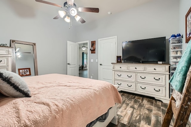 11741 Buckthorn Dr, Fort Worth, TX 76108 - bedroom featuring dark wood-style floors, a towering ceiling, and ceiling fan