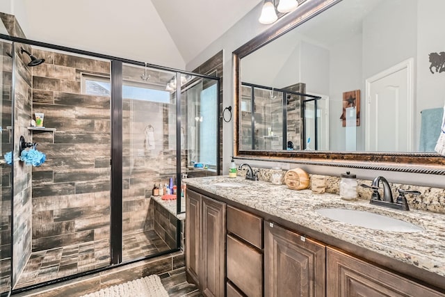 11741 Buckthorn Dr, Fort Worth, TX 76108 - bathroom with vaulted ceiling, a stall shower, and double vanity