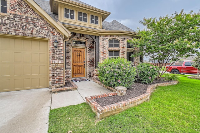 11741 Buckthorn Dr, Fort Worth, TX 76108 - entrance to property featuring brick siding, roof with shingles, a yard, and concrete driveway