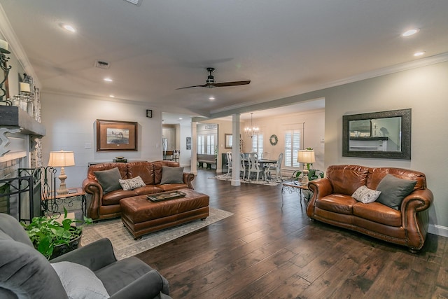 200 Sabine Creek Rd, Royse City, TX 75189 - living room with a chandelier, ceiling fan, ornamental molding, wood-type flooring, and a brick fireplace