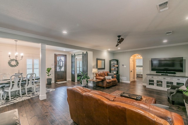 200 Sabine Creek Rd, Royse City, TX 75189 - living area with baseboards, arched walkways, dark wood-style floors, crown molding, and recessed lighting