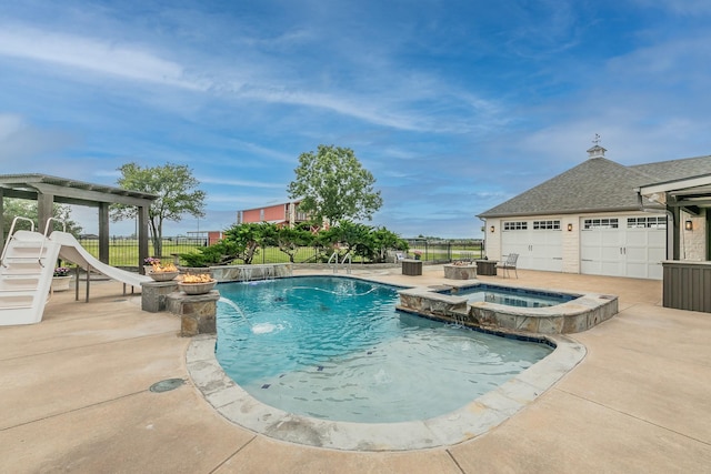 200 Sabine Creek Rd, Royse City, TX 75189 - view of swimming pool with a water slide, a pool with connected hot tub, and a patio