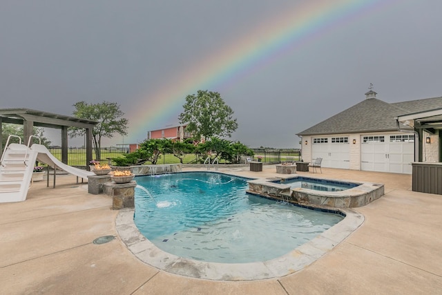 200 Sabine Creek Rd, Royse City, TX 75189 - view of swimming pool featuring a water slide, a pool with connected hot tub, and a patio