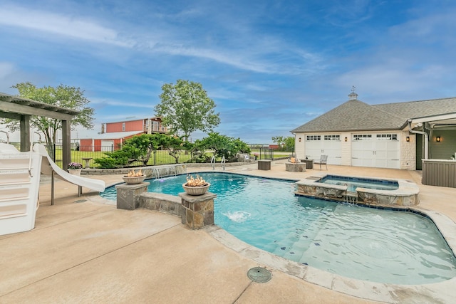 200 Sabine Creek Rd, Royse City, TX 75189 - view of pool with a water slide, a pool with connected hot tub, and a patio