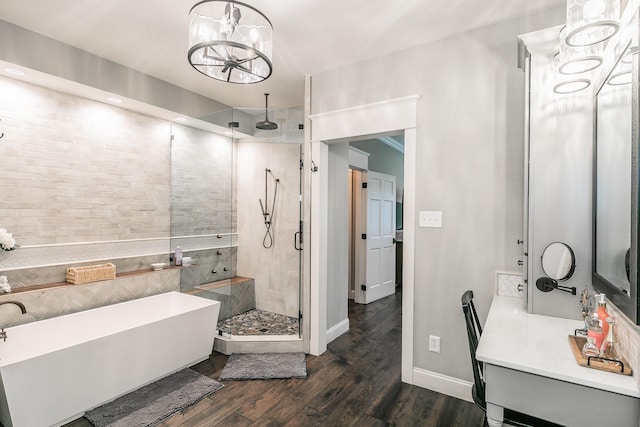 200 Sabine Creek Rd, Royse City, TX 75189 - full bath featuring a chandelier, a stall shower, wood finished floors, baseboards, and vanity
