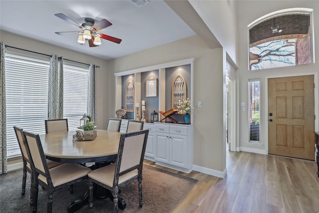 2904 Coventry Ln, Mckinney, TX 75069 - dining room featuring light wood finished floors, ceiling fan, and baseboards