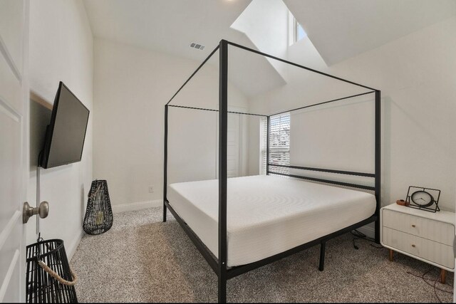 2414 Seth Dr, Midlothian, TX 76065 - carpeted bedroom featuring vaulted ceiling and baseboards