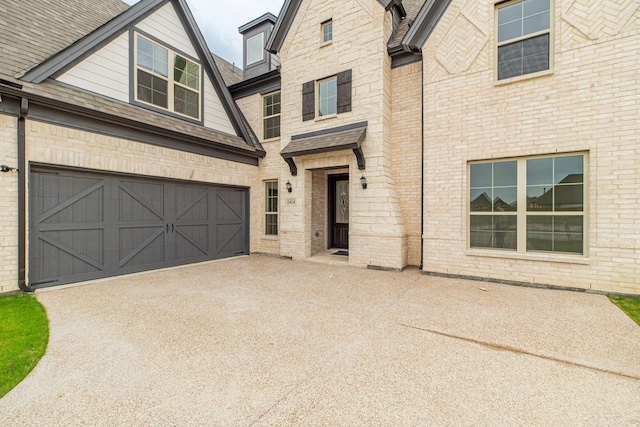 2414 Seth Dr, Midlothian, TX 76065 - view of front of property with driveway, an attached garage, and brick siding