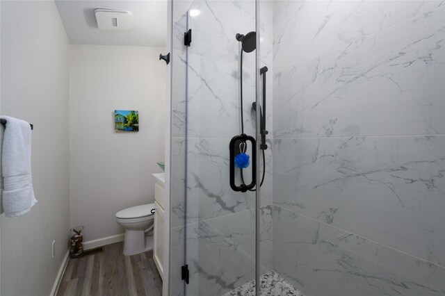 207 Wales Dr, Pottsboro, TX 75076 - full bathroom featuring a marble finish shower, vanity, and wood finished floors