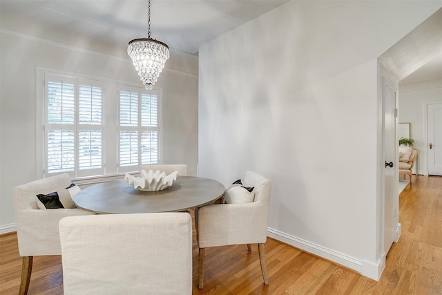 3201 Lamesa Pl, Fort Worth, TX 76109 - dining space featuring a chandelier, light wood finished floors, and baseboards