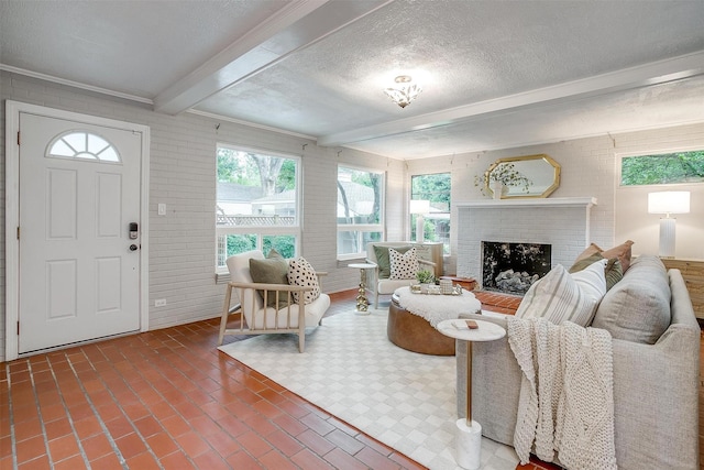 3201 Lamesa Pl, Fort Worth, TX 76109 - living room with beam ceiling, a brick fireplace, a textured ceiling, and crown molding