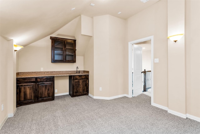 4312 Oxbow Dr, Mckinney, TX 75072 - indoor wet bar featuring light carpet, lofted ceiling, and baseboards