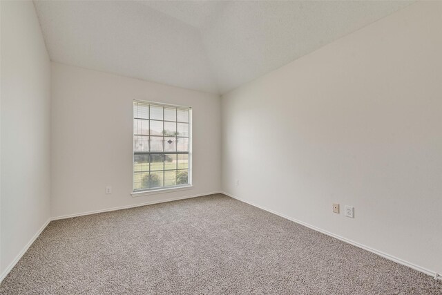 1326 Rosewood Ln, Lancaster, TX 75146 - carpeted spare room with baseboards and vaulted ceiling