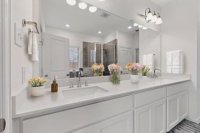 3804 Honeycomb Holw, Melissa, TX 75454 - bathroom featuring double vanity, a stall shower, and recessed lighting