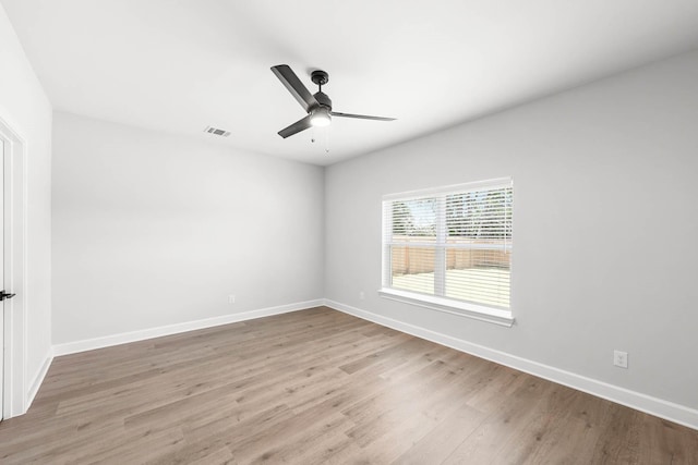 332 Live Oak Ln, Hutchins, TX 75141 - spare room with ceiling fan, wood finished floors, and baseboards