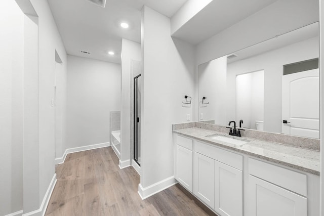 332 Live Oak Ln, Hutchins, TX 75141 - full bath featuring a shower with door, a tub to relax in, vanity, baseboards, and recessed lighting