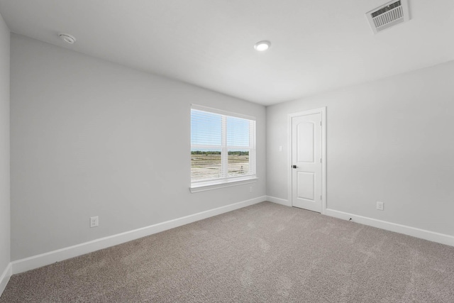 332 Live Oak Ln, Hutchins, TX 75141 - empty room with carpet floors, baseboards, and a smoke detector
